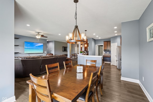 1893 Devonshire Ave, Avon, IN 46123 - dining area with dark wood-type flooring, a chandelier, baseboards, recessed lighting, and a ceiling fan