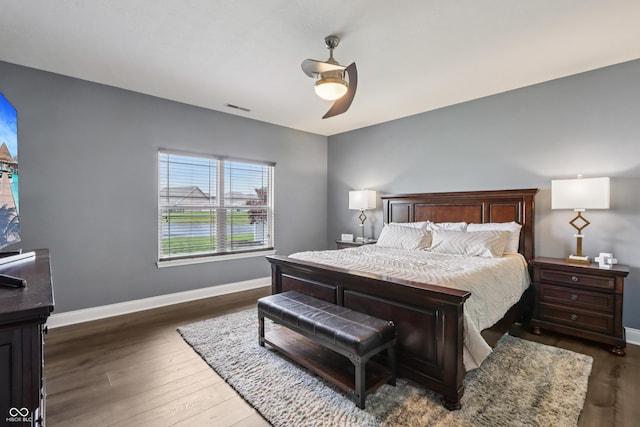 1893 Devonshire Ave, Avon, IN 46123 - bedroom featuring baseboards, dark wood finished floors, and ceiling fan