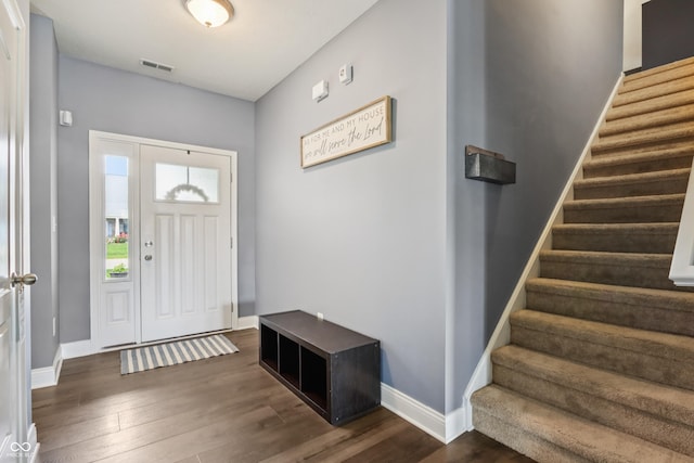 1893 Devonshire Ave, Avon, IN 46123 - entrance foyer with stairway, dark wood-type flooring, and baseboards