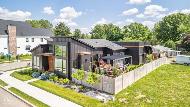 8695 Morgan Dr, Fishers, IN 46038 - back of house with board and batten siding