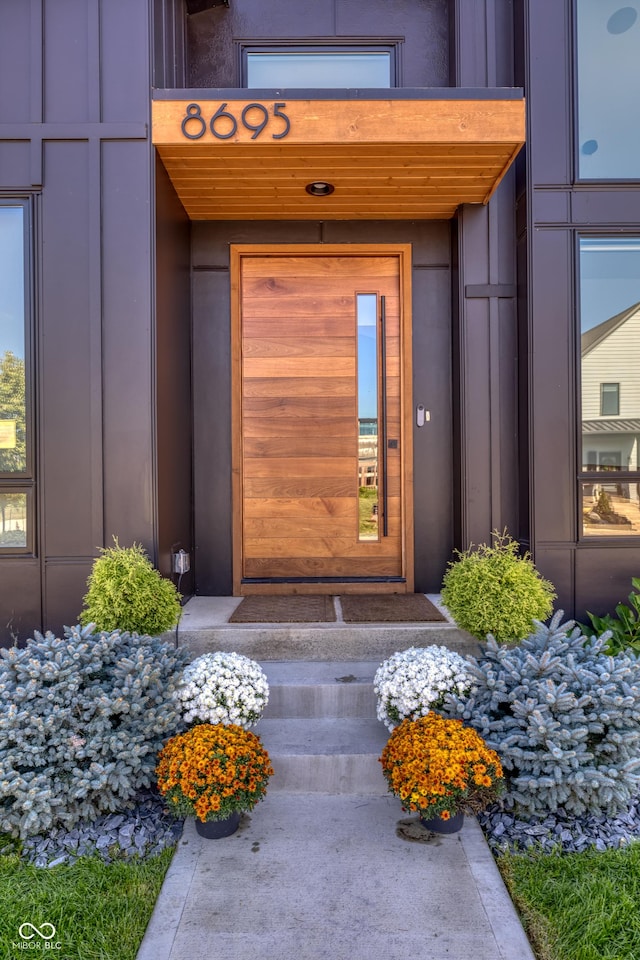 8695 Morgan Dr, Fishers, IN 46038 - view of exterior entry with board and batten siding