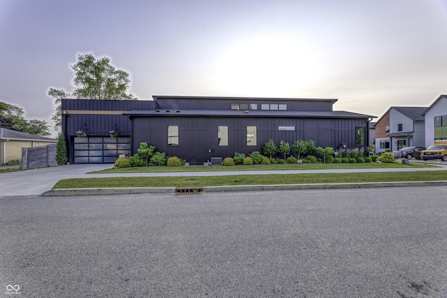 8695 Morgan Dr, Fishers, IN 46038 - view of front of home featuring concrete driveway, board and batten siding, and a garage