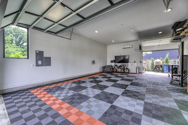 8695 Morgan Dr, Fishers, IN 46038 - garage with electric panel, recessed lighting, and an AC wall unit