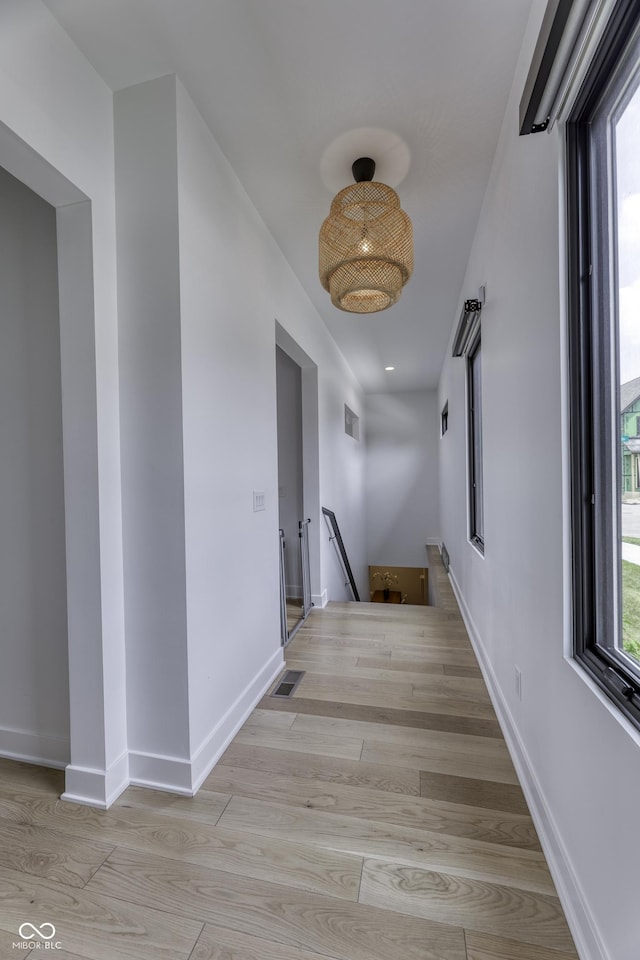 8695 Morgan Dr, Fishers, IN 46038 - hall featuring an upstairs landing and light wood finished floors