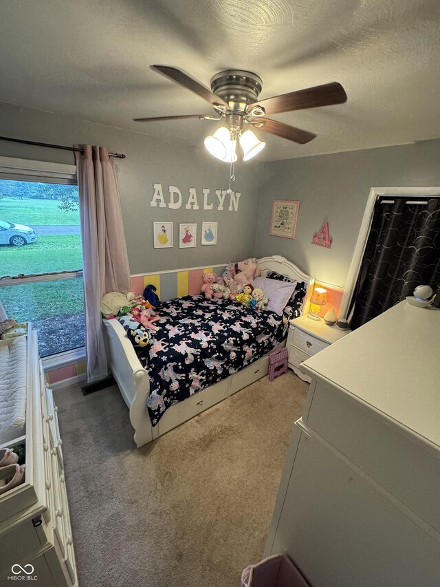 800 N Walnut Hls, Crawfordsville, IN 47933 - bedroom featuring carpet, a textured ceiling, and a ceiling fan