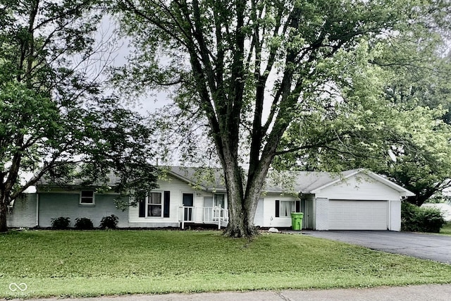 800 N Walnut Hls, Crawfordsville, IN 47933 - ranch-style home featuring driveway, an attached garage, and a front yard