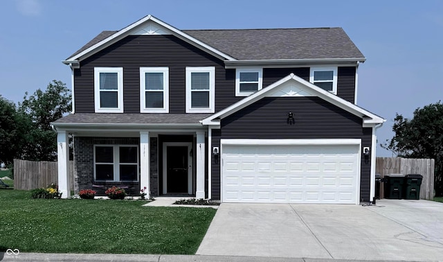 1721 N Kaleigh Ln, Greensburg, IN 47240 - traditional home with an attached garage, concrete driveway, and roof with shingles