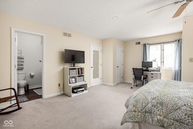 8133 Lower Bay Ln, Indianapolis, IN 46236 - carpeted bedroom featuring a ceiling fan and ensuite bath
