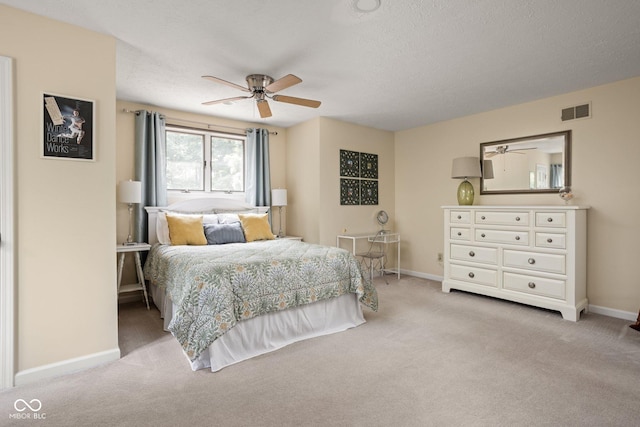 8133 Lower Bay Ln, Indianapolis, IN 46236 - bedroom with light carpet, ceiling fan, and a textured ceiling