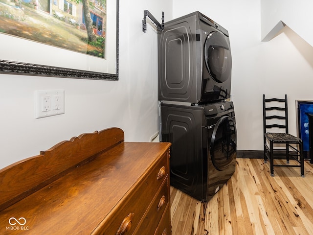 2004 Layton Rd, Anderson, IN 46011 - laundry area featuring stacked washer / dryer and light wood finished floors