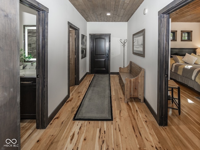 2004 Layton Rd, Anderson, IN 46011 - hall with light wood-type flooring, baseboards, and wooden ceiling