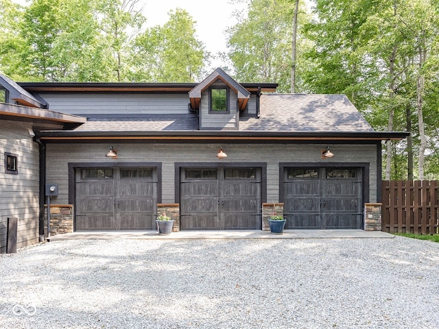 2004 Layton Rd, Anderson, IN 46011 - garage featuring gravel driveway