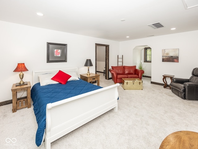 2004 Layton Rd, Anderson, IN 46011 - carpeted bedroom with arched walkways, baseboards, and recessed lighting