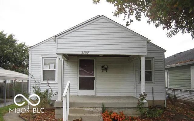 3954 Fletcher Ave, Indianapolis, IN 46203 - bungalow-style home with covered porch
