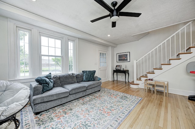 8436 E 56th St, Indianapolis, IN 46216 - living area with a textured ceiling, stairway, hardwood / wood-style floors, recessed lighting, and a ceiling fan