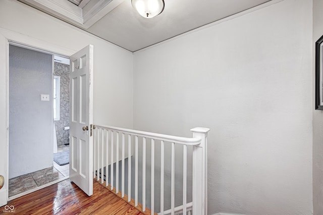 8436 E 56th St, Indianapolis, IN 46216 - hallway featuring wood finished floors and an upstairs landing