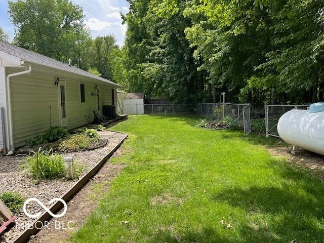 9451 S Amanda Dr, Claypool, IN 46510 - view of yard with central AC