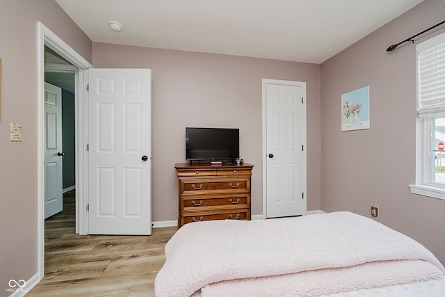 293 E Quail Wood Ln, Westfield, IN 46074 - bedroom with wood finished floors and baseboards