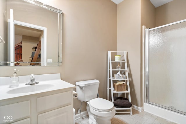 15515 Alameda Pl, Westfield, IN 46074 - bathroom featuring a shower stall, vanity, toilet, and baseboards