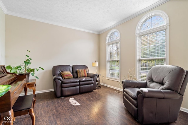 15515 Alameda Pl, Westfield, IN 46074 - living area with crown molding, dark wood-style floors, baseboards, and a textured ceiling