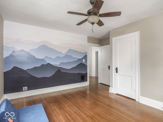 4455 Central Ave, Indianapolis, IN 46205 - spare room with wood finished floors, baseboards, and ceiling fan