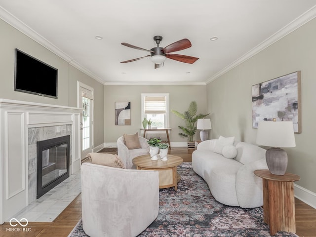 4455 Central Ave, Indianapolis, IN 46205 - living area with plenty of natural light, a ceiling fan, crown molding, a premium fireplace, and baseboards