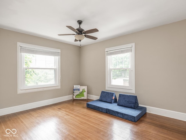 4455 Central Ave, Indianapolis, IN 46205 - unfurnished room with wood finished floors, baseboards, and a ceiling fan