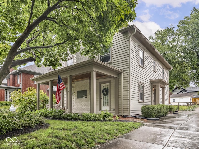 4455 Central Ave, Indianapolis, IN 46205 - view of front of property with brick siding and covered porch
