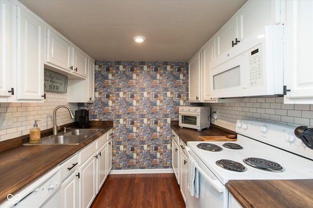 2766 Del Prado Dr Unit 6, Indianapolis, IN 46227 - kitchen with white appliances, wood counters, a sink, white cabinetry, and decorative backsplash