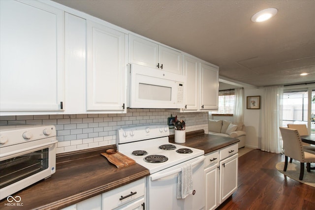 2766 Del Prado Dr Unit 6, Indianapolis, IN 46227 - kitchen featuring white appliances, butcher block counters, healthy amount of natural light, white cabinetry, and recessed lighting