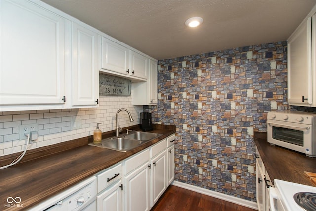 2766 Del Prado Dr Unit 6, Indianapolis, IN 46227 - kitchen with wooden counters, a sink, white appliances, white cabinets, and tasteful backsplash