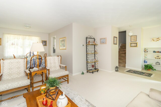 12014 Briar Way Center Dr, Indianapolis, IN 46126 - living area with stairway, carpet, and baseboards