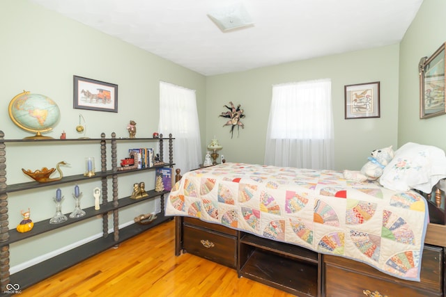12014 Briar Way Center Dr, Indianapolis, IN 46126 - bedroom with multiple windows and light wood-type flooring