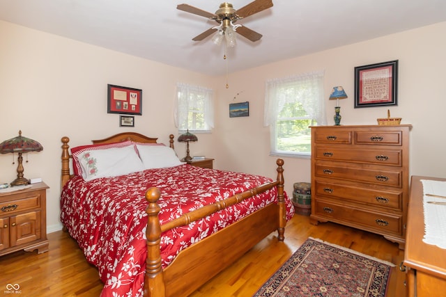 12014 Briar Way Center Dr, Indianapolis, IN 46126 - bedroom with light wood-style flooring and ceiling fan