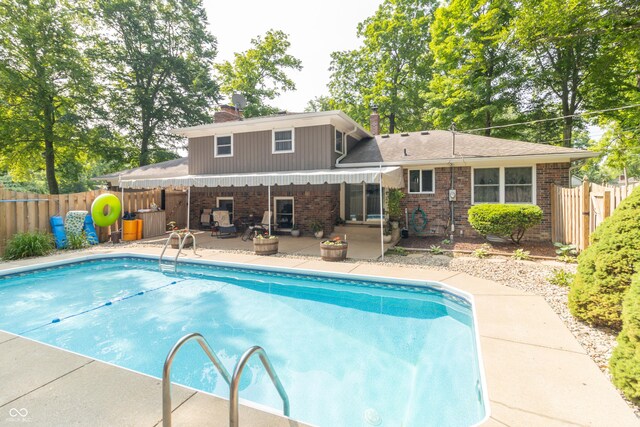12014 Briar Way Center Dr, Indianapolis, IN 46126 - view of swimming pool featuring a patio
