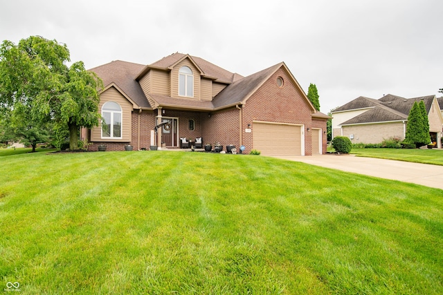 1145 Forest Commons Dr, Avon, IN 46123 - traditional-style house featuring a garage, driveway, a front lawn, and brick siding