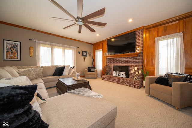 1145 Forest Commons Dr, Avon, IN 46123 - carpeted living area featuring ornamental molding, ceiling fan, a brick fireplace, and wood walls