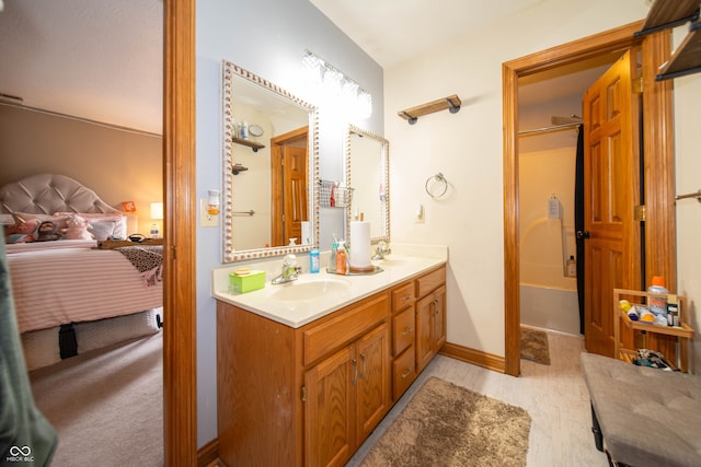 1145 Forest Commons Dr, Avon, IN 46123 - ensuite bathroom featuring double vanity and shower / tub combination