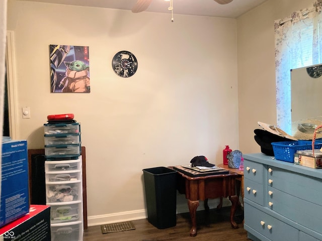 2032 N Auburn St, Speedway, IN 46224 - bedroom with dark wood-style flooring, baseboards, and a ceiling fan