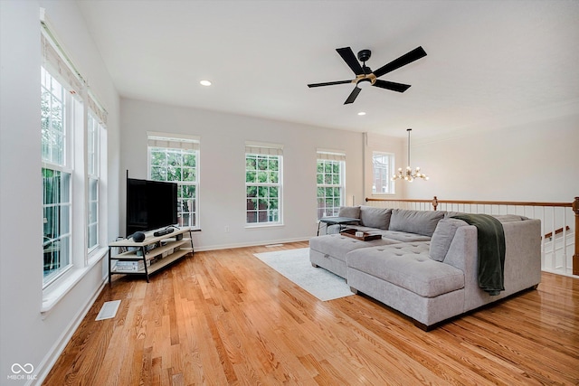 755 Ivy Ln, Carmel, IN 46032 - living area with a chandelier, light wood finished floors, a ceiling fan, and recessed lighting