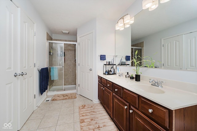 755 Ivy Ln, Carmel, IN 46032 - bathroom with double vanity, a stall shower, and tile patterned floors