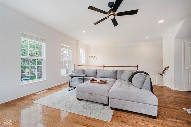 755 Ivy Ln, Carmel, IN 46032 - living room featuring a chandelier, ceiling fan, wood finished floors, and recessed lighting