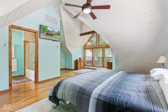 2540 S Annapolis Rd, Rockville, IN 47872 - bedroom with wood finished floors, vaulted ceiling, and baseboards