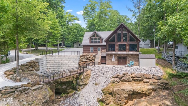 2540 S Annapolis Rd, Rockville, IN 47872 - rear view of property featuring stairway and metal roof