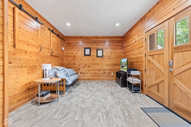 2540 S Annapolis Rd, Rockville, IN 47872 - sitting room featuring a barn door, wood finished floors, recessed lighting, wooden walls, and wooden ceiling