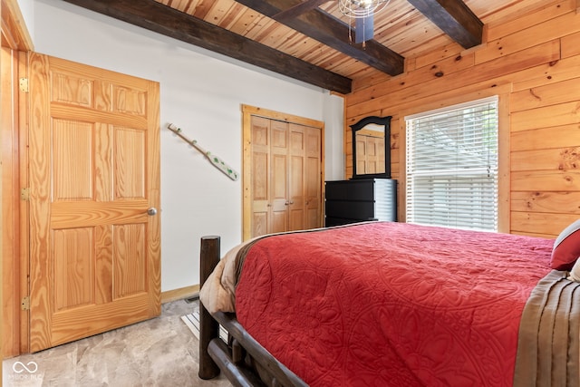 2540 S Annapolis Rd, Rockville, IN 47872 - bedroom featuring wood ceiling with exposed beams, wood walls, and a closet