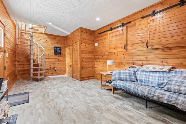 2540 S Annapolis Rd, Rockville, IN 47872 - living area with a barn door, stairway, recessed lighting, and wooden walls