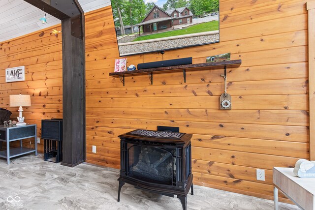 2540 S Annapolis Rd, Rockville, IN 47872 - detailed view of a wood stove, wood walls, and concrete floors