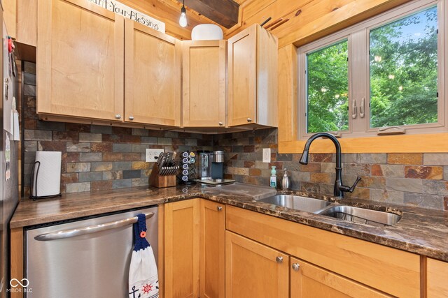 2540 S Annapolis Rd, Rockville, IN 47872 - kitchen with stainless steel dishwasher, a sink, backsplash, light brown cabinetry, and dark stone counters