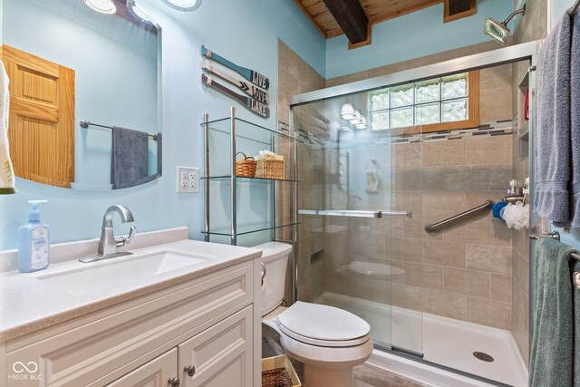 2540 S Annapolis Rd, Rockville, IN 47872 - bathroom featuring toilet, vanity, a stall shower, and wooden ceiling with exposed beams